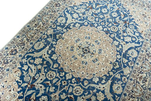 Backside of handmade 1950s Nain rug showing knot structure and weave density