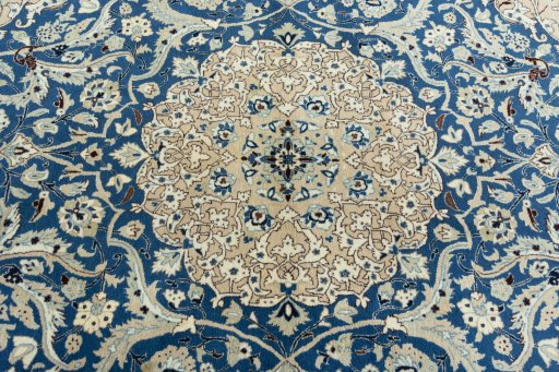 Central medallion detail of 1950s Nain rug from Iran / Persia