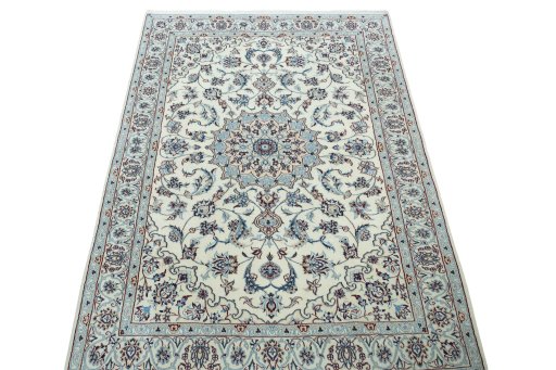 Surface texture of New Nain rug with natural Wool and intricate pattern