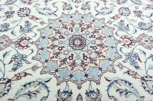 Central medallion detail of New Nain rug from Iran / Persia