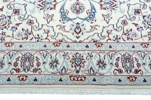 Full view of New Nain rug from Iran / Persia, 204 × 137 cm in Beige tones