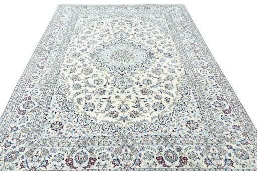 Surface texture of 2000s Nain rug with natural Wool and intricate pattern
