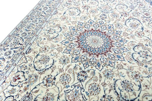 Backside of handmade New Nain rug showing knot structure and weave density