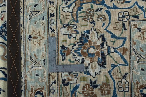 Backside of handmade 2000s Nain rug showing knot structure and weave density