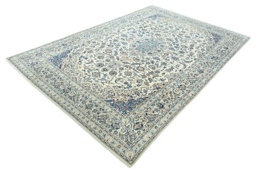 Corner detail of 2000s Nain rug showing border pattern and Wool pile