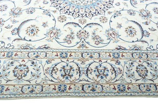Corner detail of New Nain rug showing border pattern and Wool pile