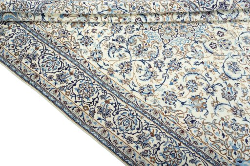 Close-up detail of 2000s Nain rug from Iran / Persia showing Wool weave