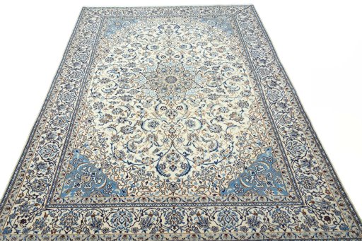 Surface texture of 2000s Nain rug with natural Wool and intricate pattern