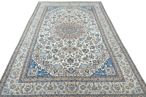 Surface texture of 2000s Nain rug with natural Wool and intricate pattern