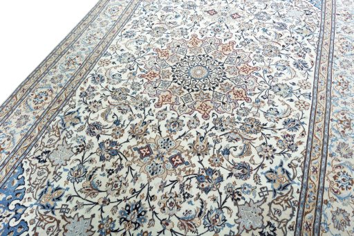 Backside of handmade 2000s Nain rug showing knot structure and weave density