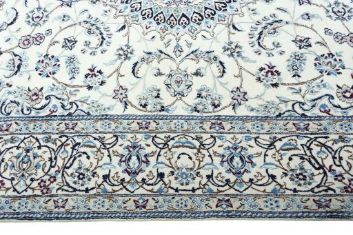 Corner detail of New Nain rug showing border pattern and Wool pile