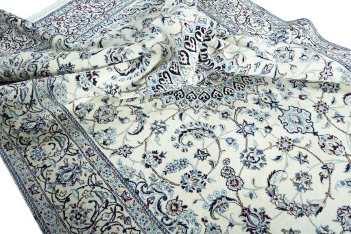 Surface texture of New Nain rug with natural Wool and intricate pattern