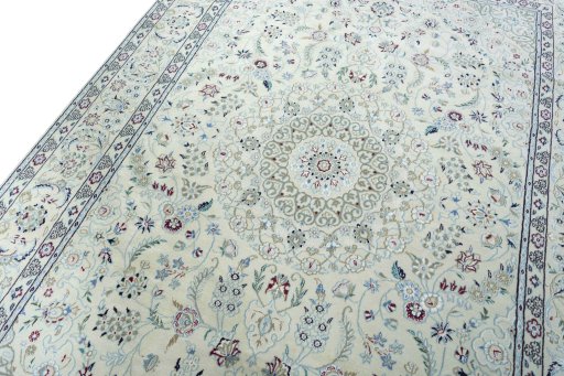 Backside of handmade New Nain rug showing knot structure and weave density