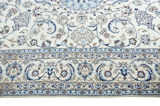 Corner detail of New Nain rug showing border pattern and Wool pile