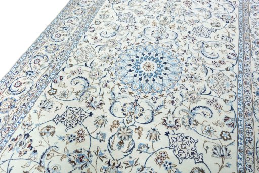 Backside of handmade New Nain rug showing knot structure and weave density
