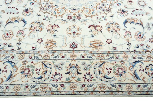 Corner detail of 2000s Nain rug showing border pattern and Wool pile