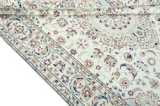 Close-up detail of 2000s Nain rug from Iran / Persia showing Wool weave