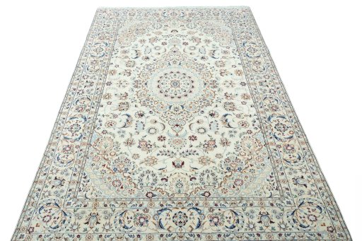 Surface texture of 2000s Nain rug with natural Wool and intricate pattern