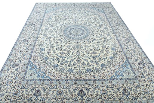 Surface texture of 2000s Nain rug with natural Wool and intricate pattern