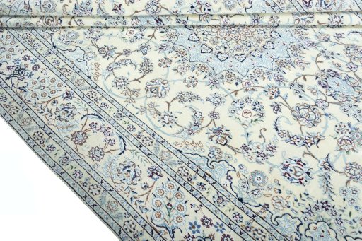 Close-up detail of 2000s Nain rug from Iran / Persia showing Wool weave