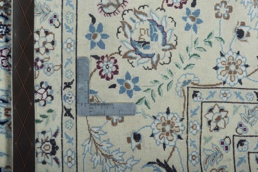 Backside of handmade 2000s Nain rug showing knot structure and weave density