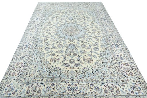 Surface texture of 2000s Nain rug with natural Wool and intricate pattern