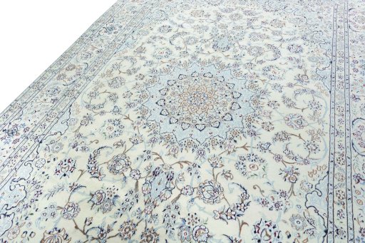 Backside of handmade 2000s Nain rug showing knot structure and weave density