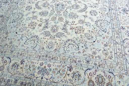 Close-up detail of 2000s Nain rug from Iran / Persia showing Wool weave