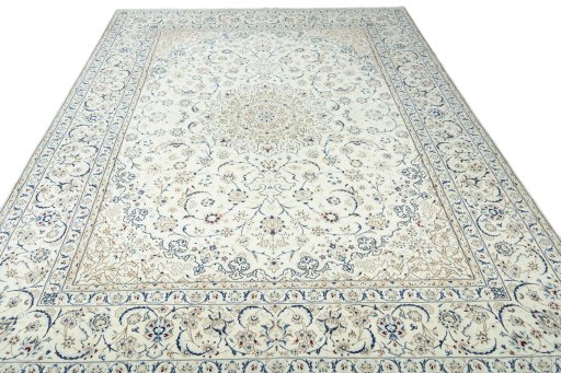Surface texture of 2000s Nain rug with natural Wool and intricate pattern