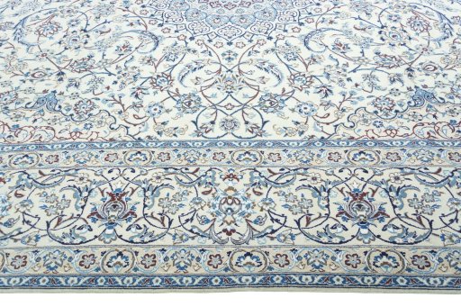 Corner detail of New Nain rug showing border pattern and Wool pile