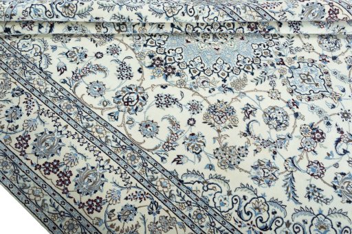 Close-up detail of 2000s Nain rug from Iran / Persia showing Wool weave