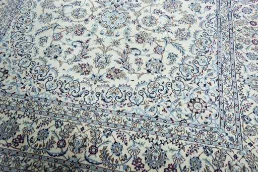Close-up detail of 2000s Nain rug from Iran / Persia showing Wool weave