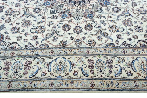 Corner detail of New Nain rug showing border pattern and Cork pile