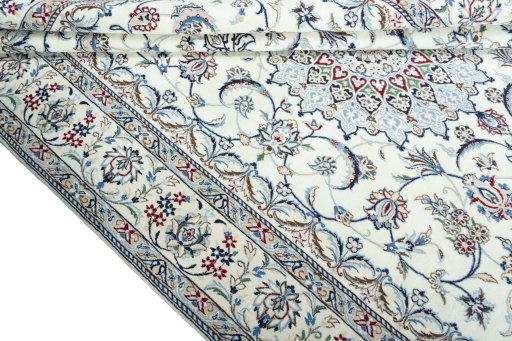 Close-up detail of 2000s Nain rug from Iran / Persia showing Wool weave