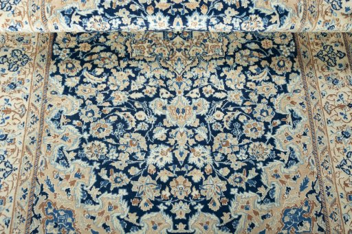 Close-up detail of 2000s Nain rug from Iran / Persia showing Wool weave