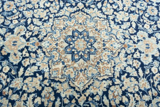 Central medallion detail of 2000s Nain rug from Iran / Persia