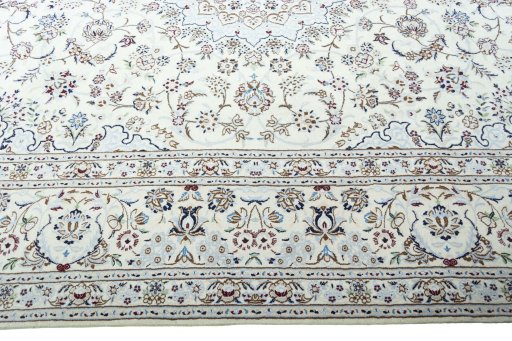 Corner detail of New Nain rug showing border pattern and Wool pile