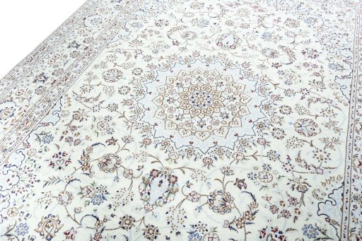 Backside of handmade New Nain rug showing knot structure and weave density