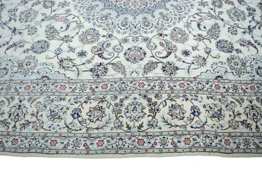 Corner detail of New Nain rug showing border pattern and Wool pile