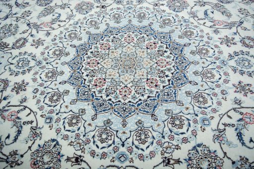 Central medallion detail of New Nain rug from Iran / Persia