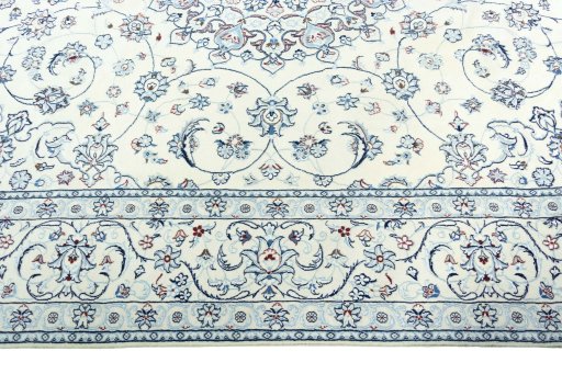 Corner detail of New Nain rug showing border pattern and Wool pile