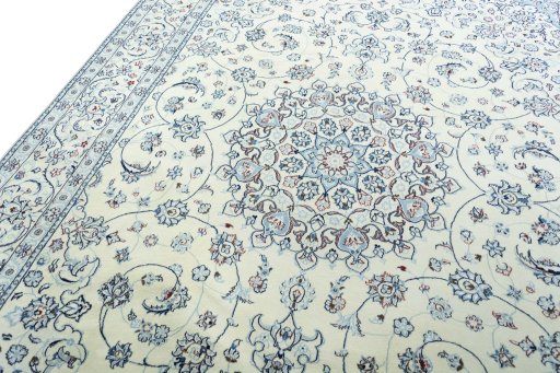 Backside of handmade New Nain rug showing knot structure and weave density