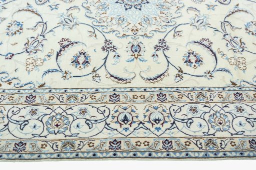 Corner detail of New Nain rug showing border pattern and Wool pile