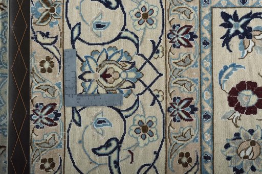 Backside of handmade New Nain rug showing knot structure and weave density