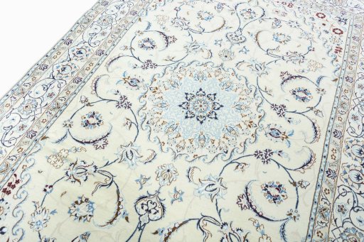 Backside of handmade New Nain rug showing knot structure and weave density