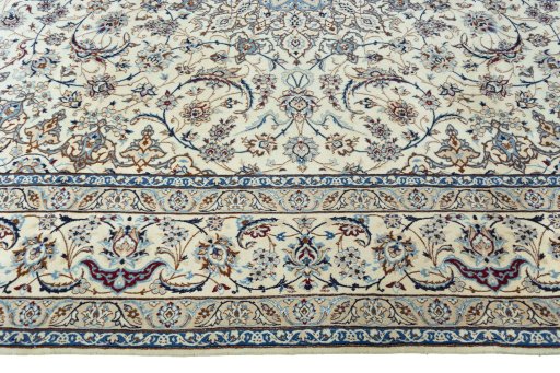 Corner detail of New Nain rug showing border pattern and Wool pile