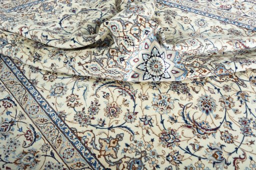 Surface texture of New Nain rug with natural Wool and intricate pattern