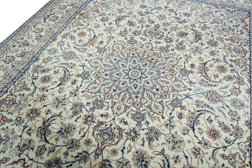 Backside of handmade New Nain rug showing knot structure and weave density
