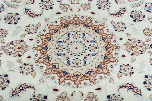 Central medallion detail of New Nain rug from Iran / Persia