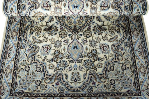 Close-up detail of New Nain rug from Iran / Persia showing Wool weave
